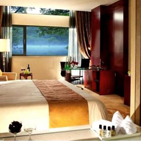 New Century Fengming Resort Zaozhuang Room photo
